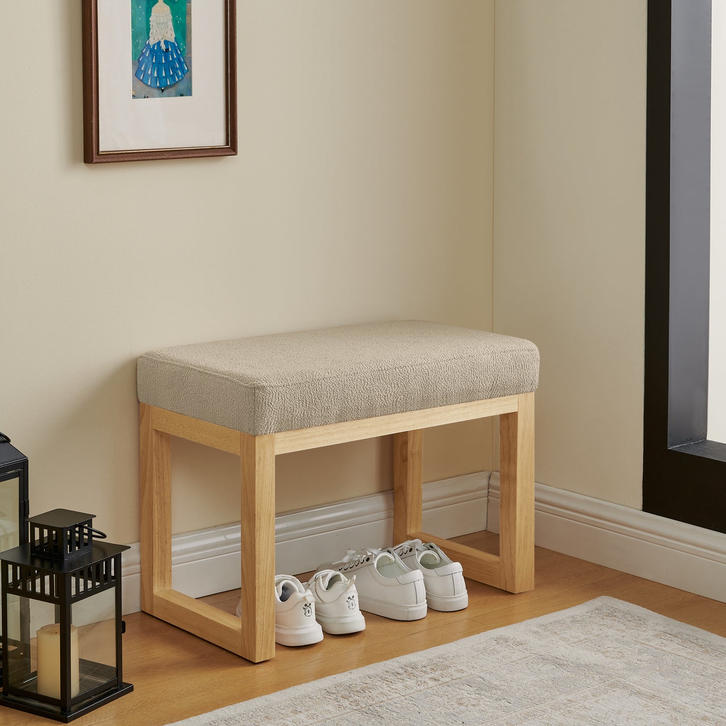 Shoe-changing bench with wooden frame and soft cushioned seat for small spaces