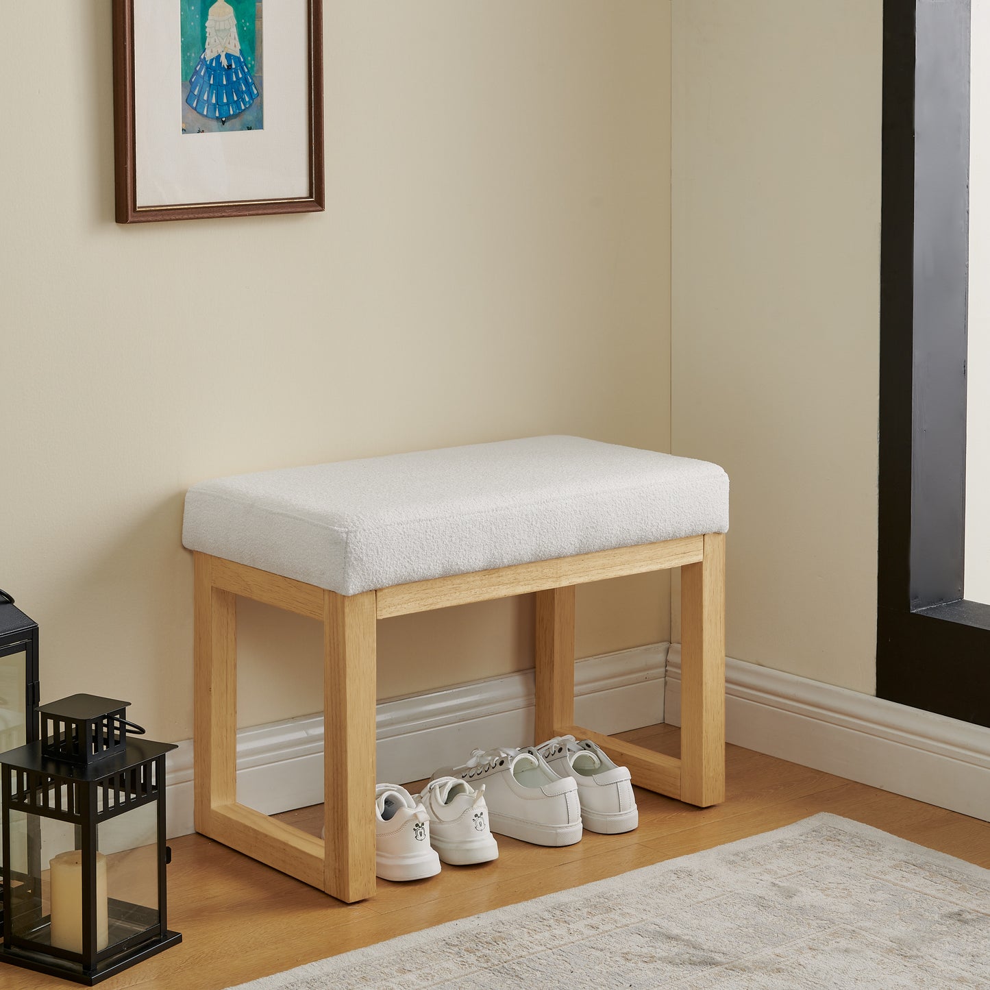 Shoe-changing bench with wooden frame and soft cushioned seat for small spaces